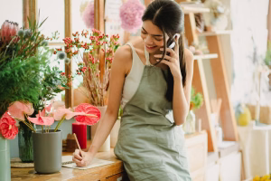 person using business phone - Fireline Broadband phone security
