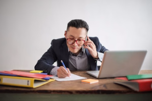 man using business phone - Fireline Broadband symmetric speed - qos 